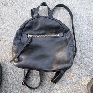 Fossil Black Leather Backpack with Gold Zipper